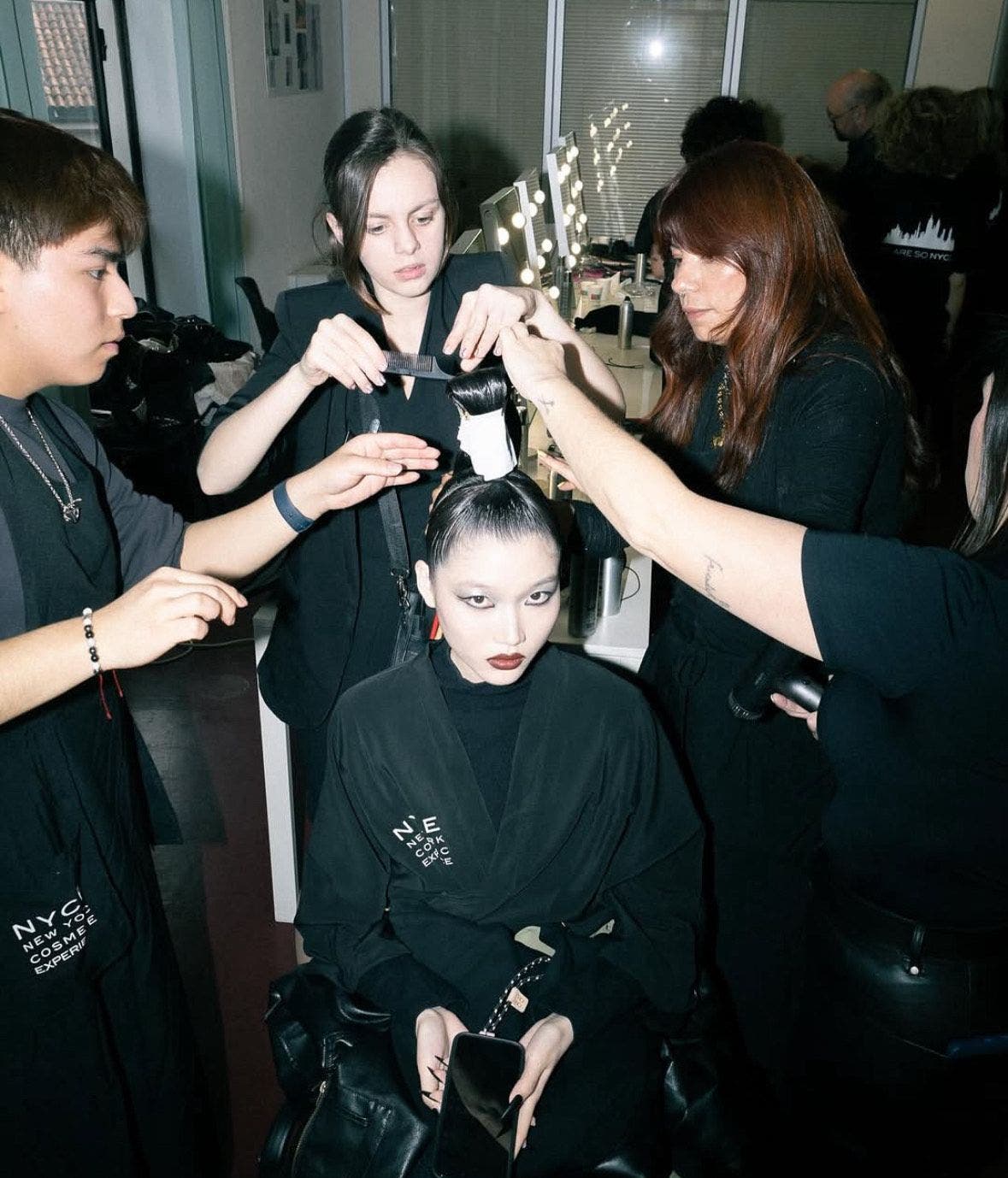 photo of ella fisher behind the scenes of paris fashion week