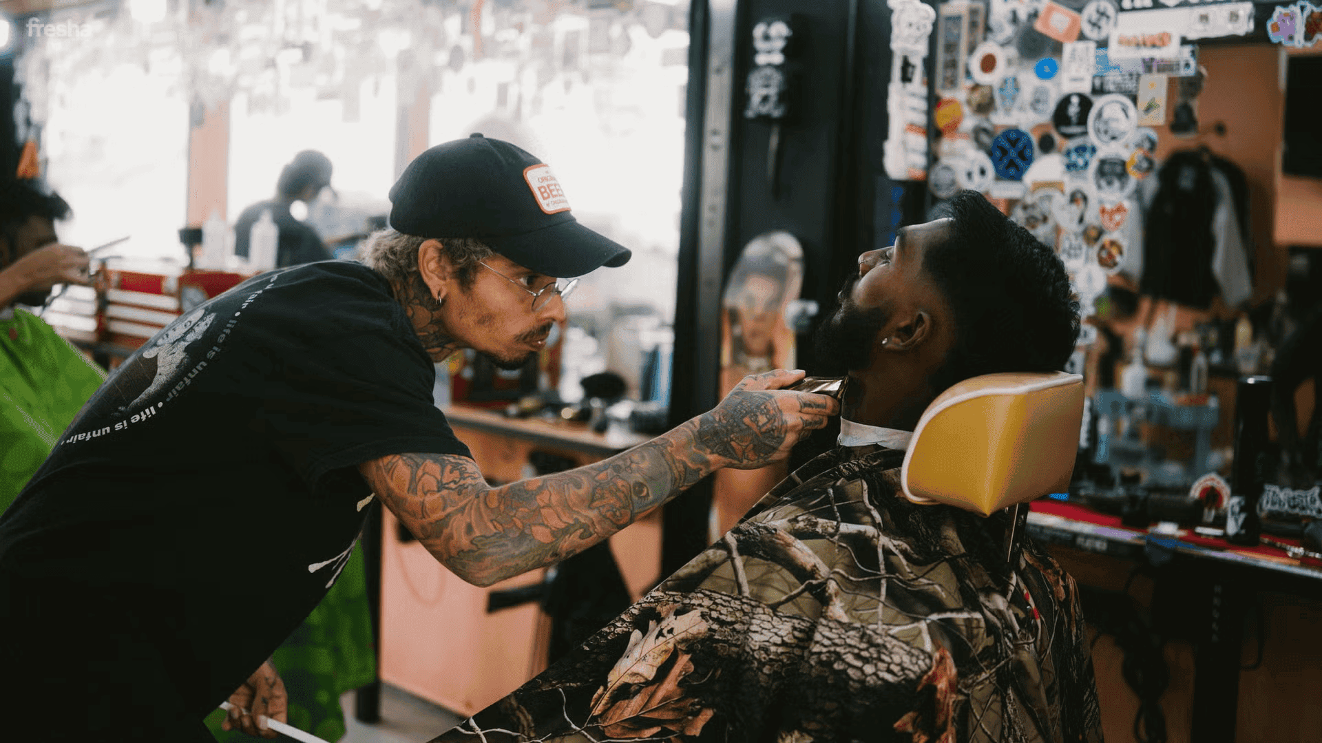 grease money barbershop in singapore with client in chair