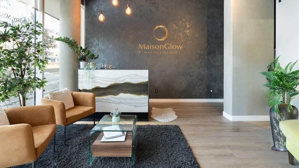 Elegant reception at MaisonGlow Spa & Wellness, Calgary, Alberta, CA with chic decor and lush plants.