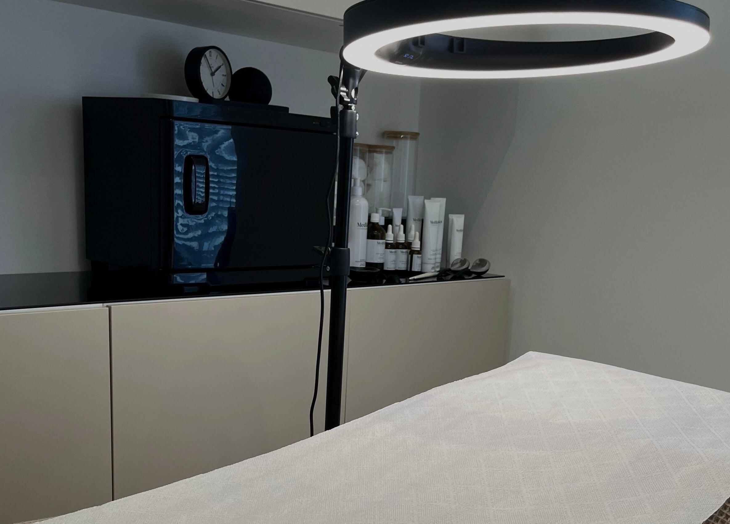 Luxurious skincare setup at Bare Skin Clinic, Worsley, England, GB featuring premium beauty products.