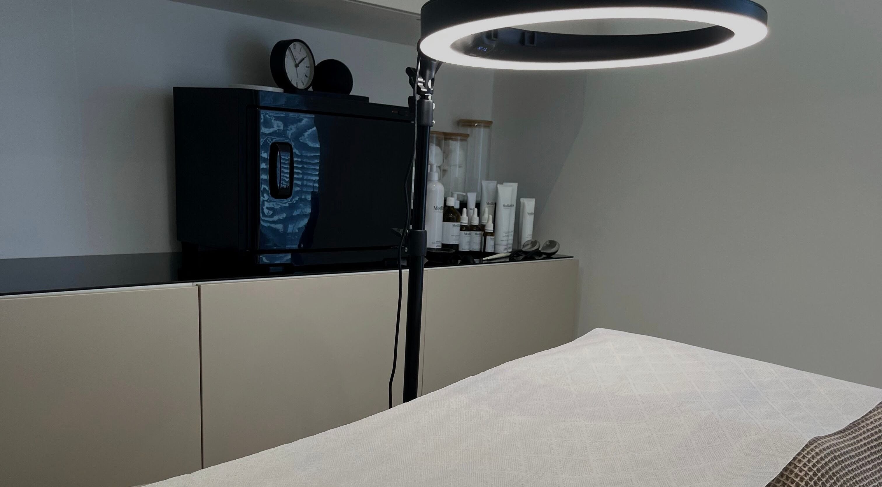 Luxurious skincare setup at Bare Skin Clinic, Worsley, England, GB featuring premium beauty products.