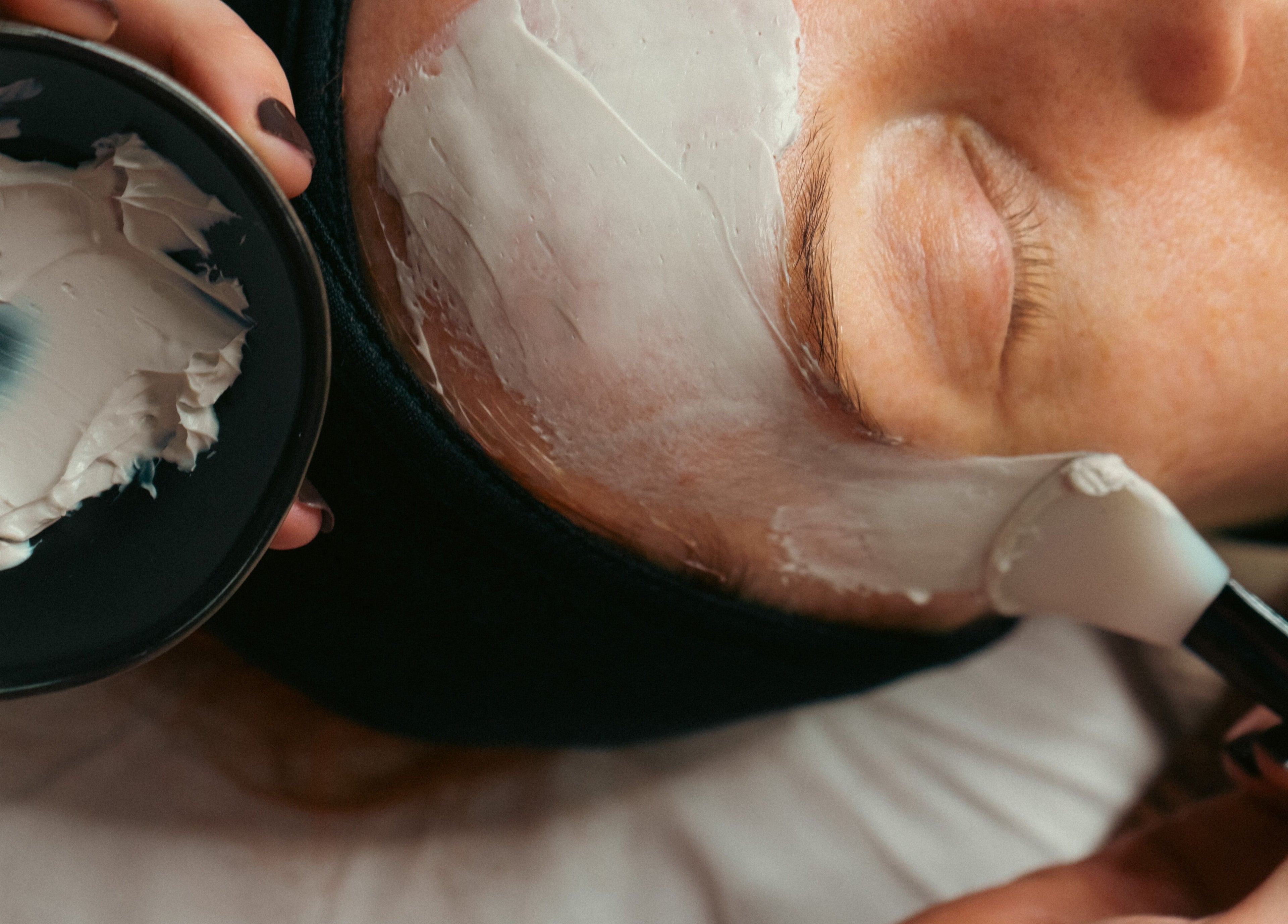 Facial treatment in progress at Bare Skin Clinic, Worsley, England, GB creating a soothing relaxation moment.