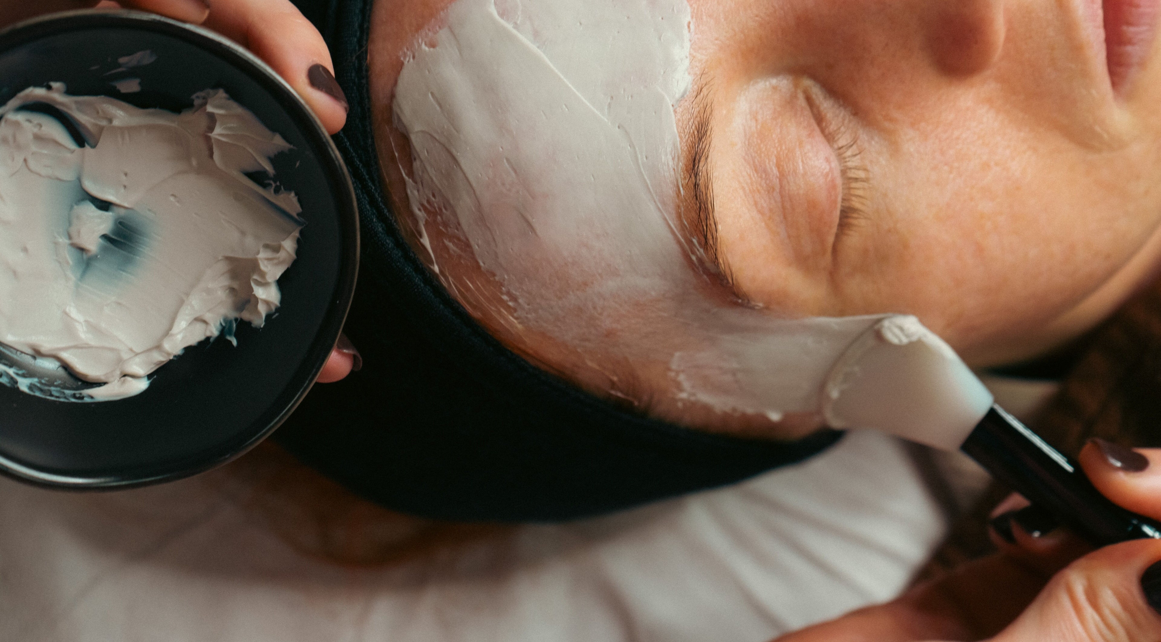 Facial treatment in progress at Bare Skin Clinic, Worsley, England, GB creating a soothing relaxation moment.