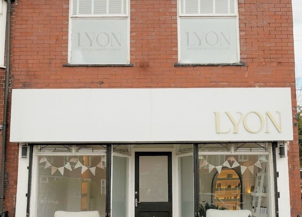 Exterior of Bare Skin Clinic in Worsley, England, GB, showcasing modern brick design.