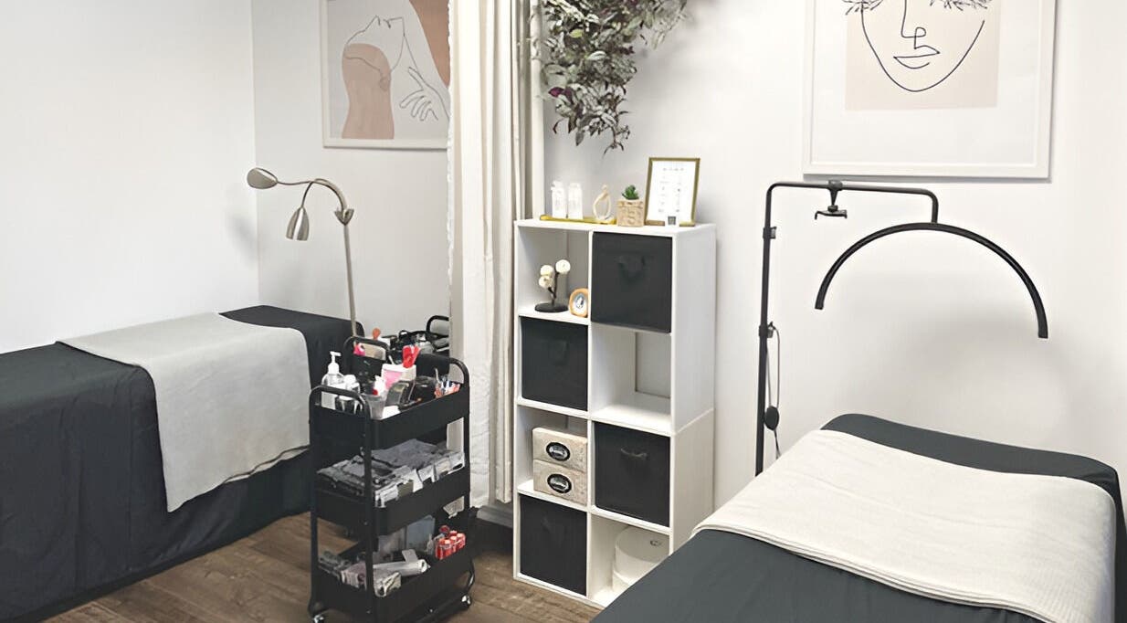 Cozy treatment room at Omalley Nails Beauty in Auckland, Auckland, NZ, featuring modern decor and comfortable beds.