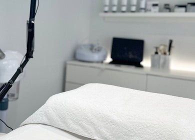 Relaxing spa setup at Sknject, Rotherham, England, GB, with treatment bed and equipment.