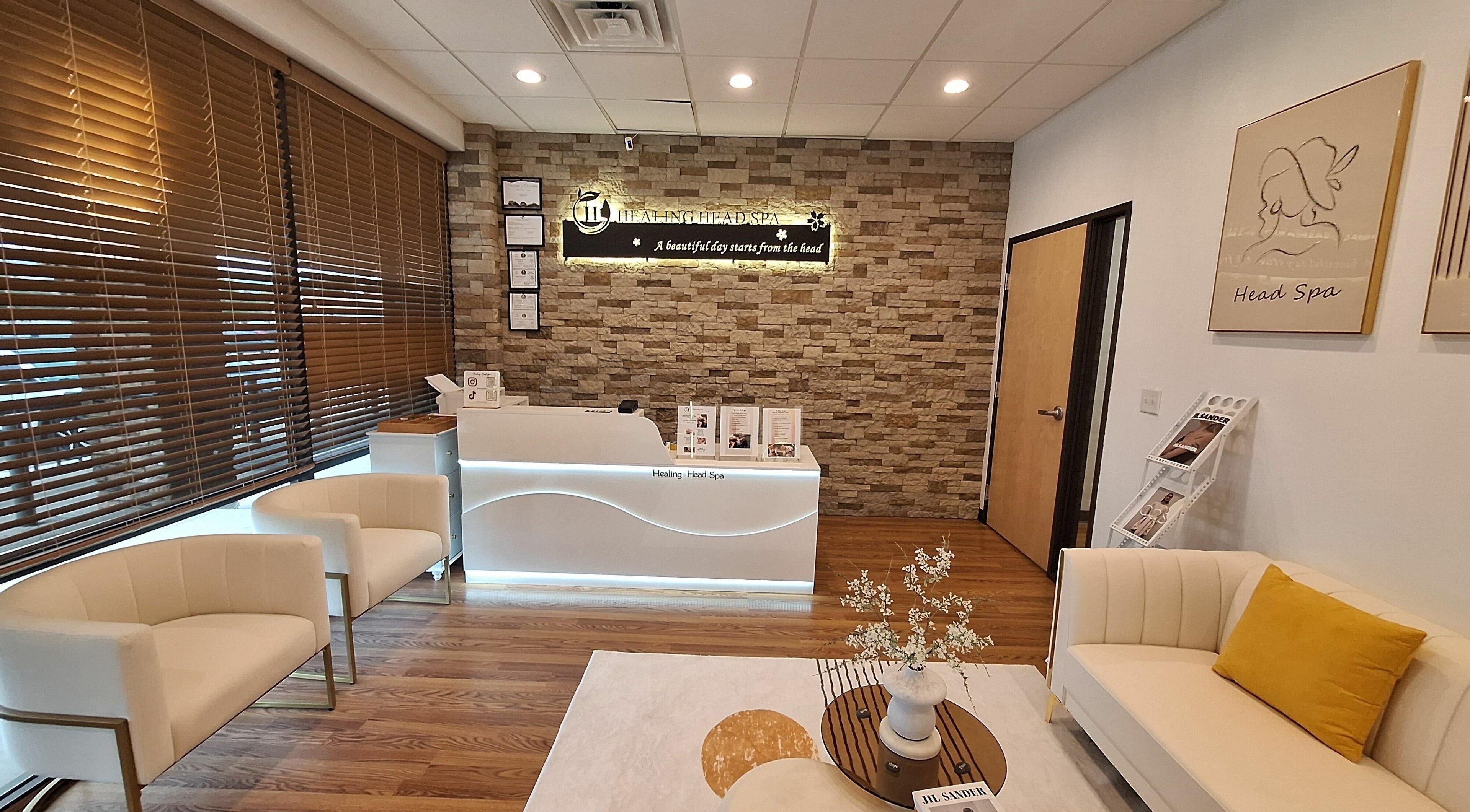 Healing Head Spa reception area in Fort Worth, Texas, US with elegant decor and cozy seating.
