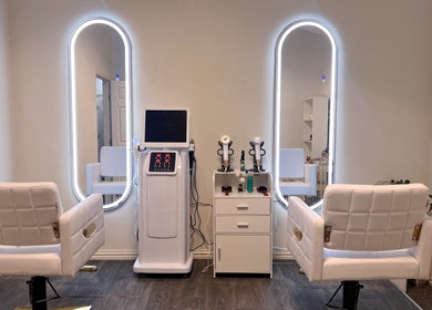 Elegant salon interior at Healing Head Spa in Arlington, Texas, US, featuring luxury styling chairs and mirrors.