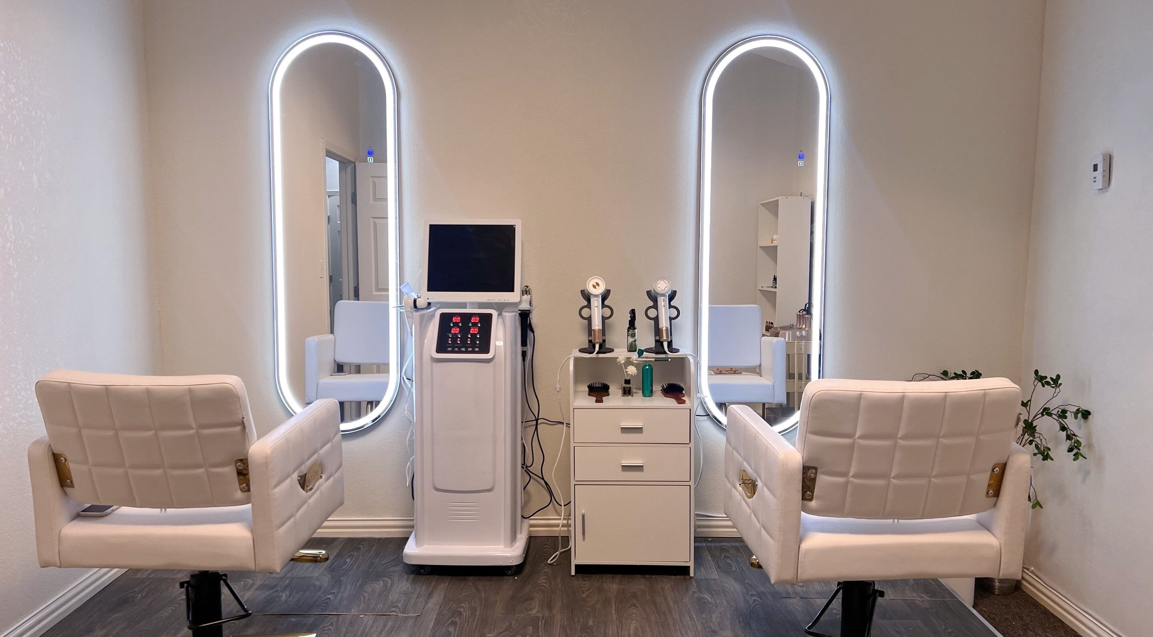 Elegant salon interior at Healing Head Spa in Arlington, Texas, US, featuring luxury styling chairs and mirrors.