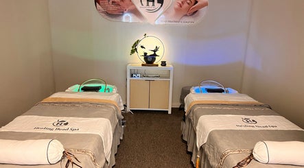 Luxurious spa room at Healing Head Spa (Arlington) with serene beds and soothing decor in Arlington, Texas, US.