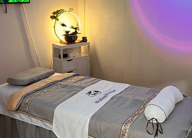 Relaxing massage bed at Healing Head Spa, Arlington, Texas, US, inviting tranquility and rejuvenation.