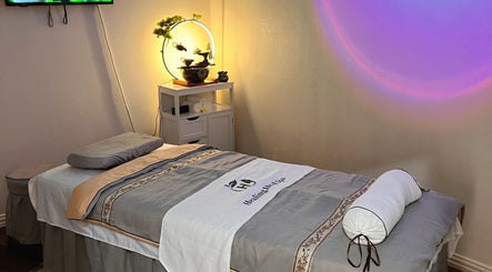 Relaxing massage bed at Healing Head Spa, Arlington, Texas, US, inviting tranquility and rejuvenation.