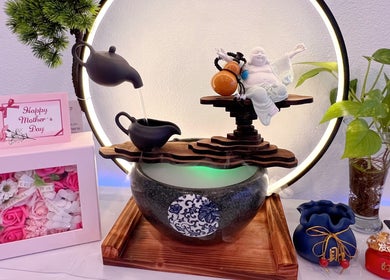 Elegant Zen-themed decor at Healing Head Spa (Arlington), Arlington, Texas, US, featuring a fountain and plants.