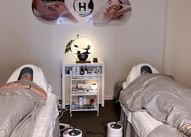Relaxing treatment rooms at Healing Head Spa, Arlington, Texas, US, offering rejuvenating spa experiences.