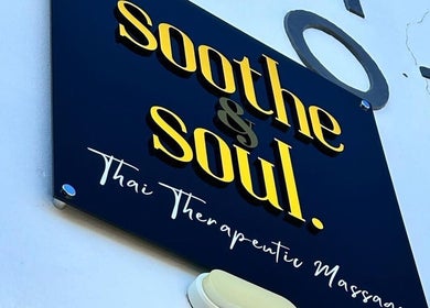 Soothe & Soul signage of Waiuku Thai Massage Therapy, Auckland, Auckland, NZ, against a white wall.