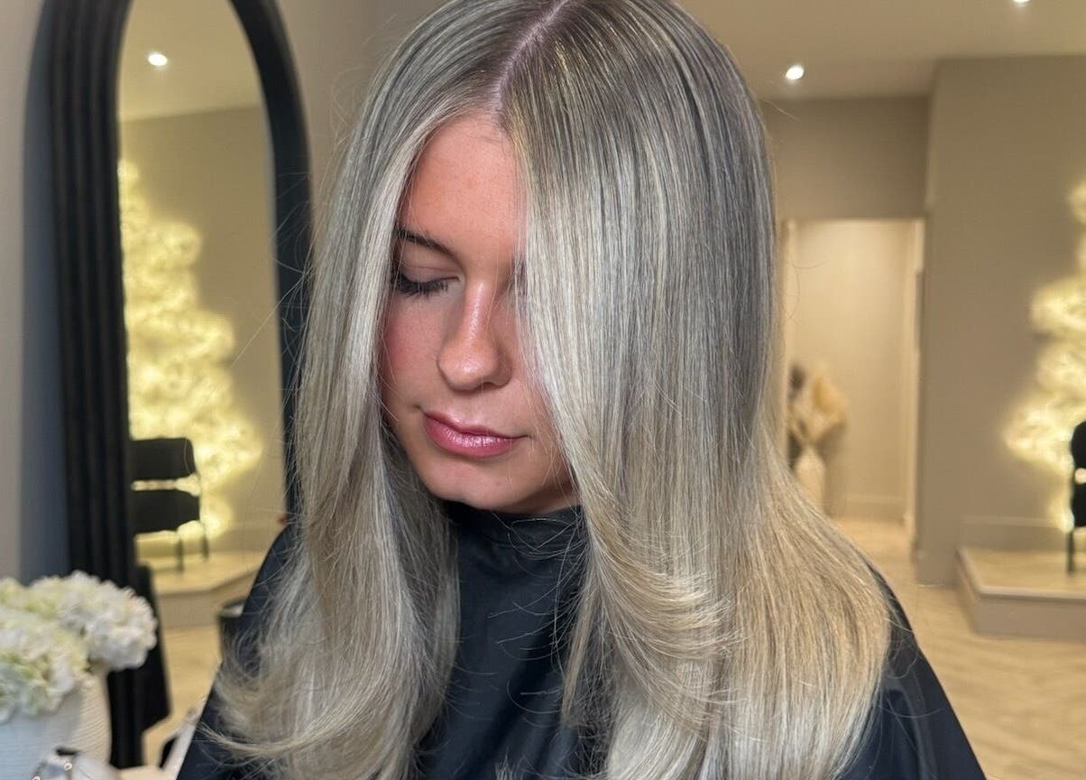 Stylish blonde hair showcased at Mane Muse salon, Pendlebury, England, GB.