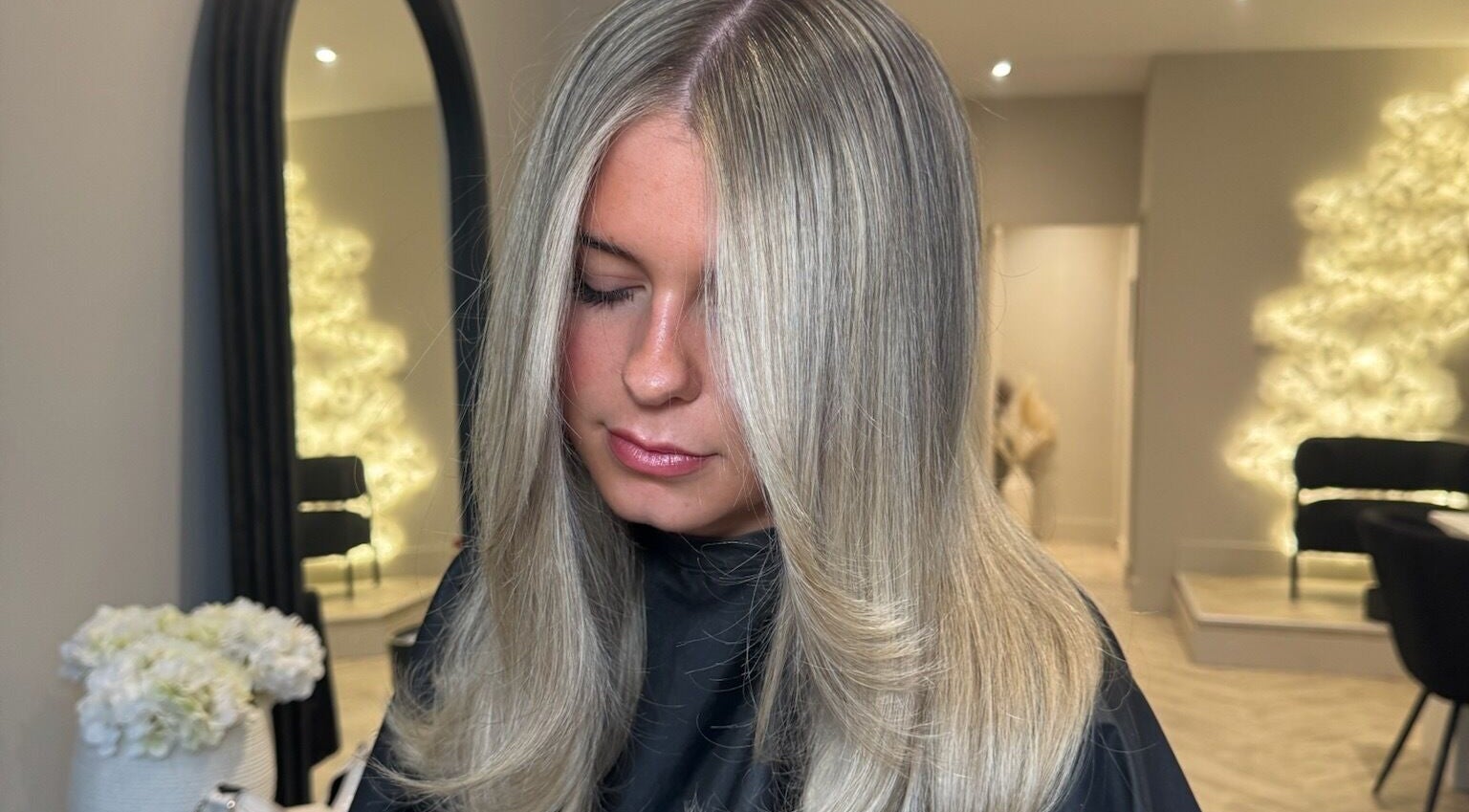 Stylish blonde hair showcased at Mane Muse salon, Pendlebury, England, GB.
