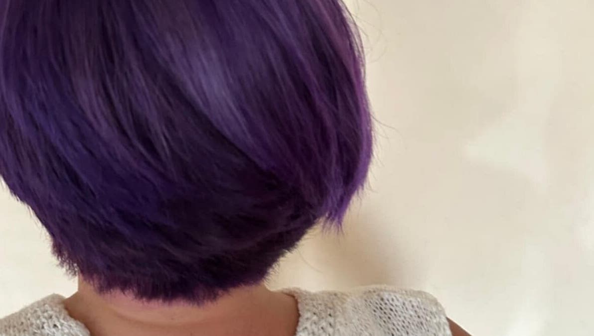 Purple bob hairstyle at Violets, Callander, Scotland, GB. A chic, vibrant hair transformation.