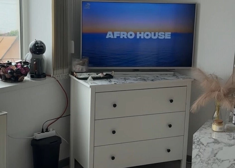 Elegant interior of Adelenailsstudio in Jūrmala, Latvija, LV with a modern dresser and decor.