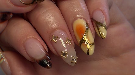 Intricate gold nail design at Chill Nails Sydney, Bonnyrigg, New South Wales, AU.