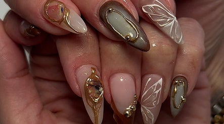 Exquisite gold-accented nail art at Chill Nails Sydney, Bonnyrigg, New South Wales, AU.