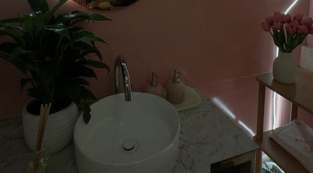 Elegant sink area at Chill Nails Sydney in Miranda, New South Wales, AU, featuring plants and pink decor.