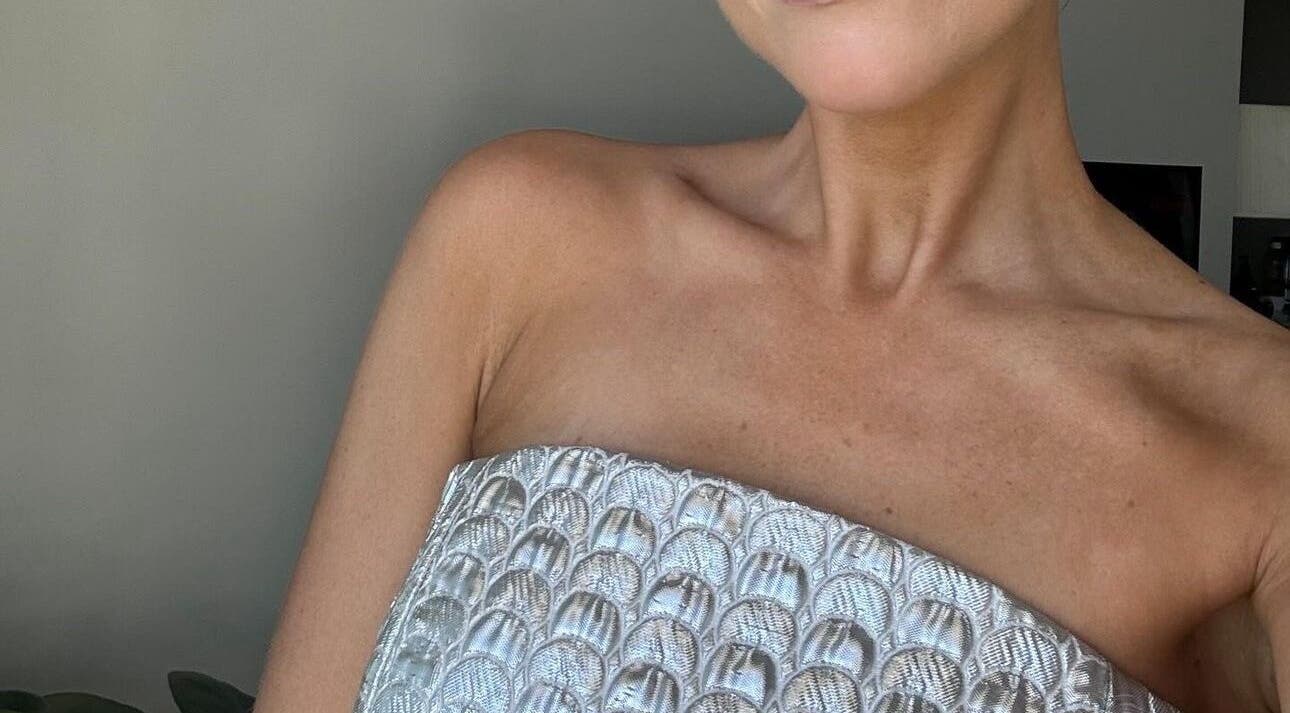 A freshly tanned person at Spray Tanning by Jessica in Bonbeach, Victoria, AU, showcasing a sun-kissed glow.