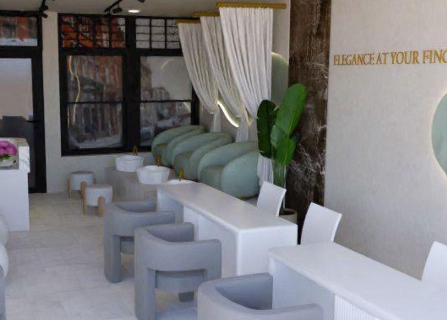 Chic interior of Biab Nails Balham in London, England, GB with plush seating and modern decor.