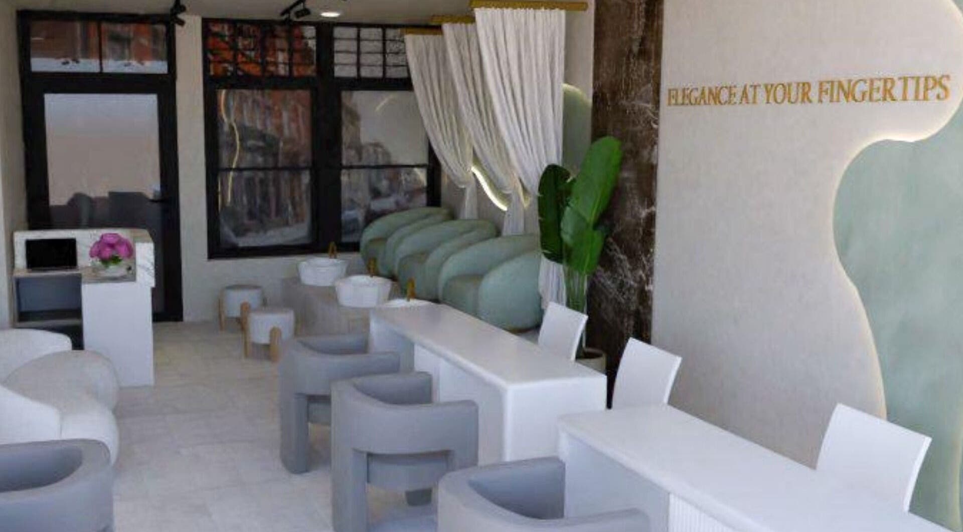 Chic interior of Biab Nails Balham in London, England, GB with plush seating and modern decor.