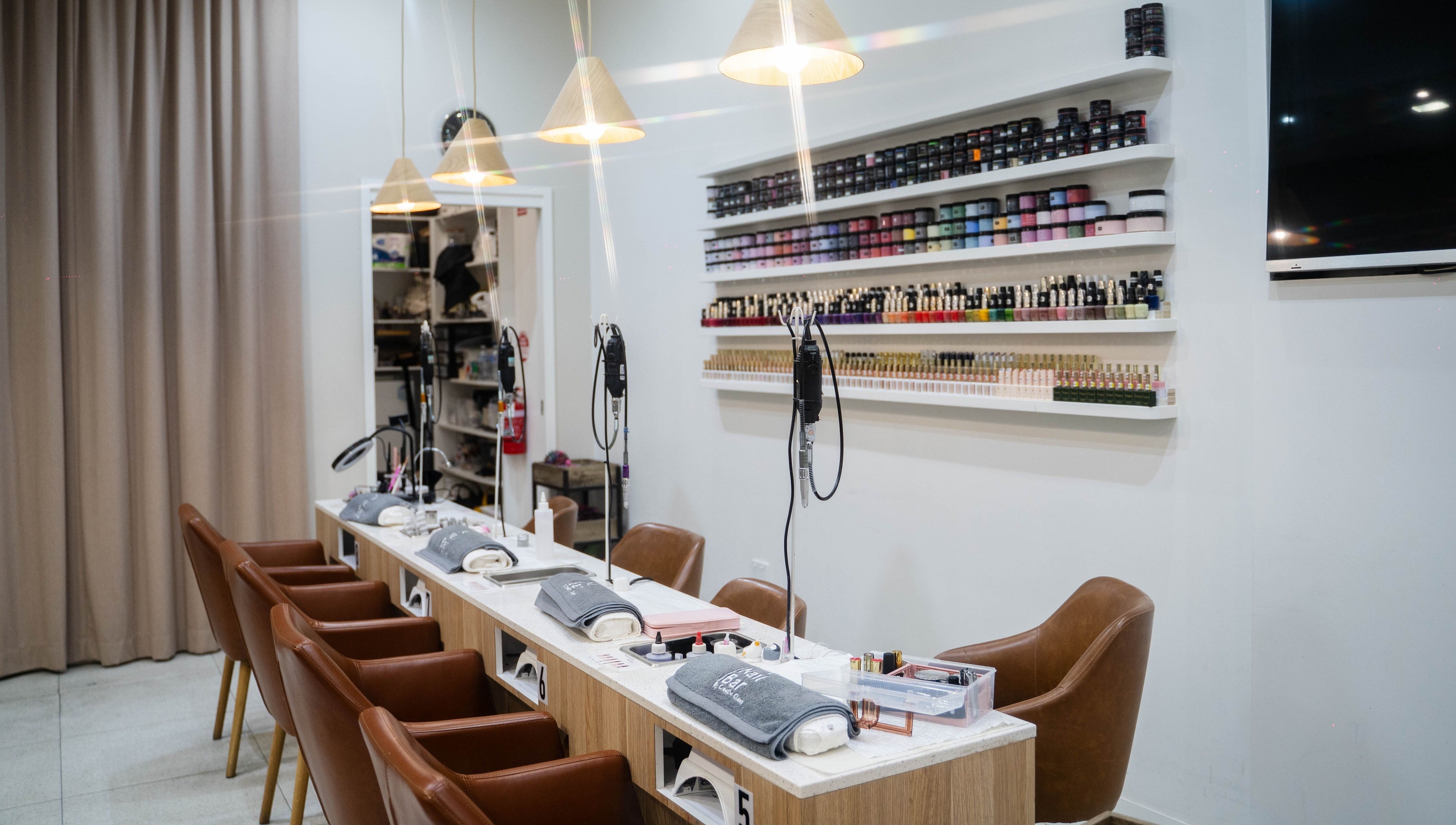 The Nail Bar By Creative Claws in Indooroopilly, Queensland, AU, showcasing elegant manicure stations.