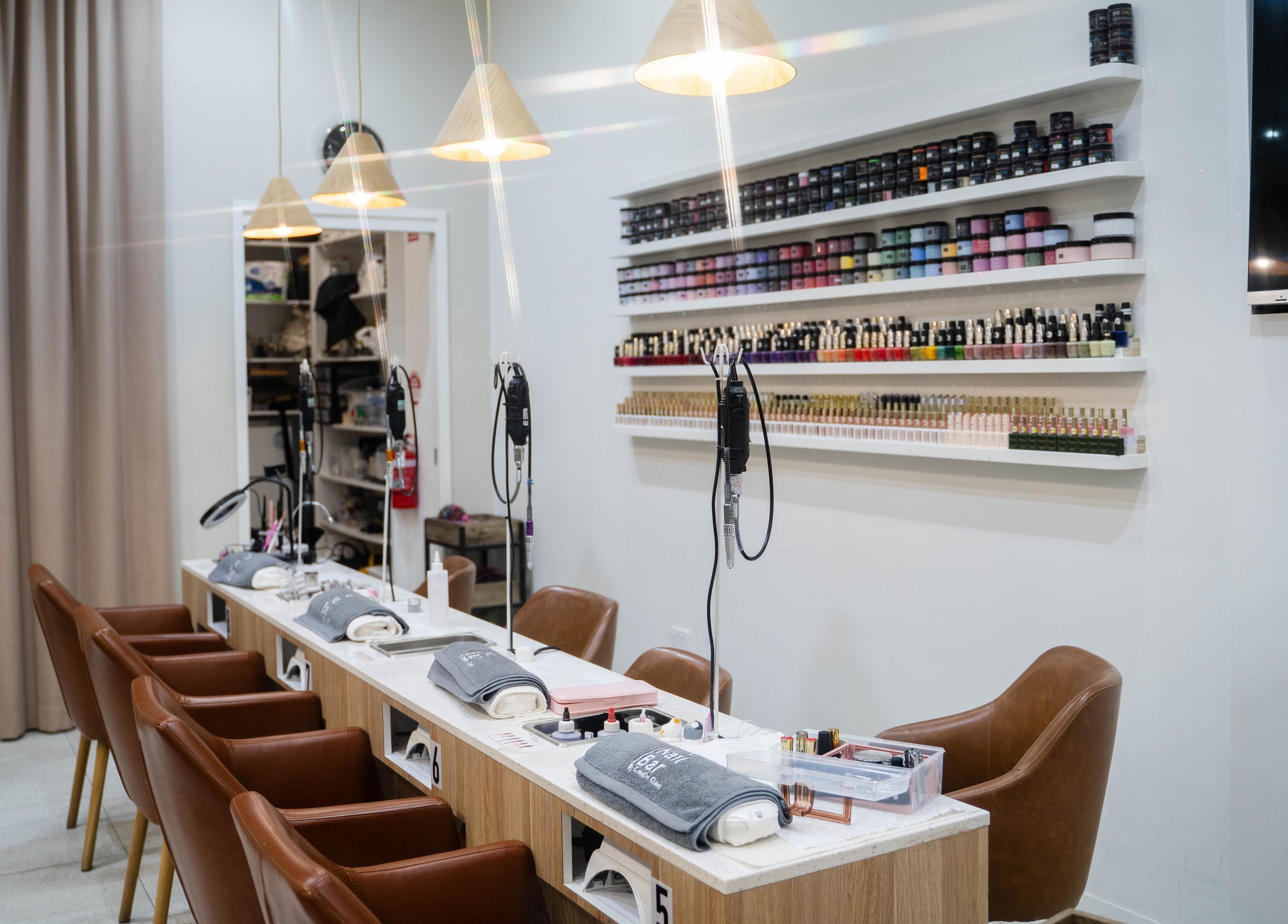 The Nail Bar By Creative Claws in Indooroopilly, Queensland, AU, showcasing elegant manicure stations.