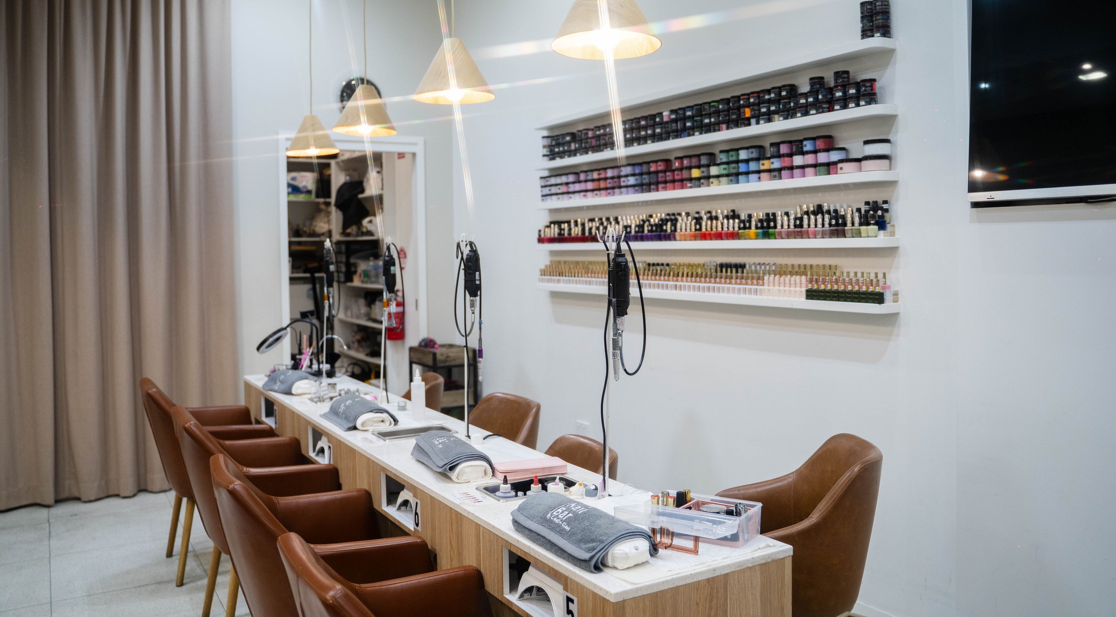 The Nail Bar By Creative Claws in Indooroopilly, Queensland, AU, showcasing elegant manicure stations.