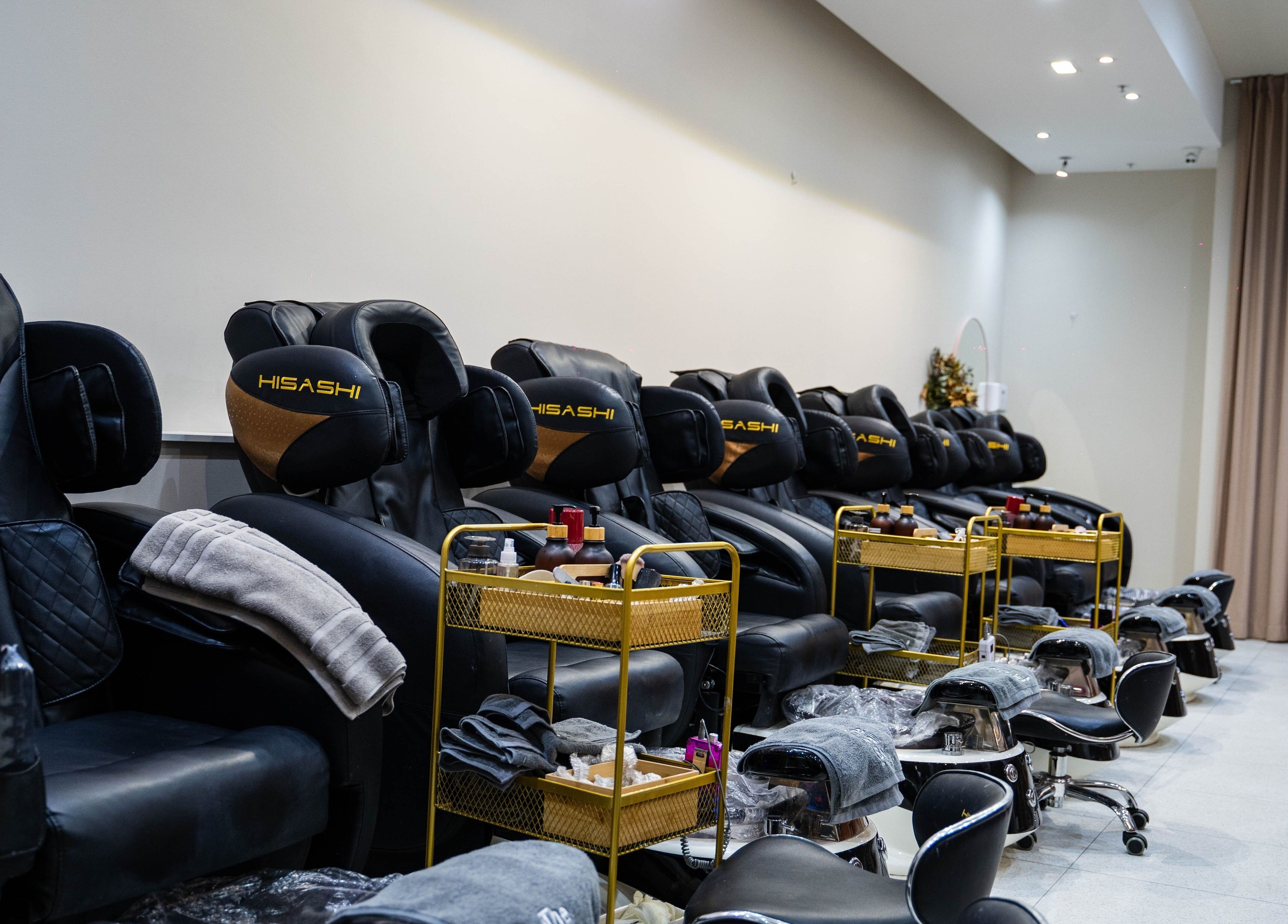 Luxurious pedicure chairs at The Nail Bar By Creative Claws, Indooroopilly, Queensland, AU, offering ultimate comfort.