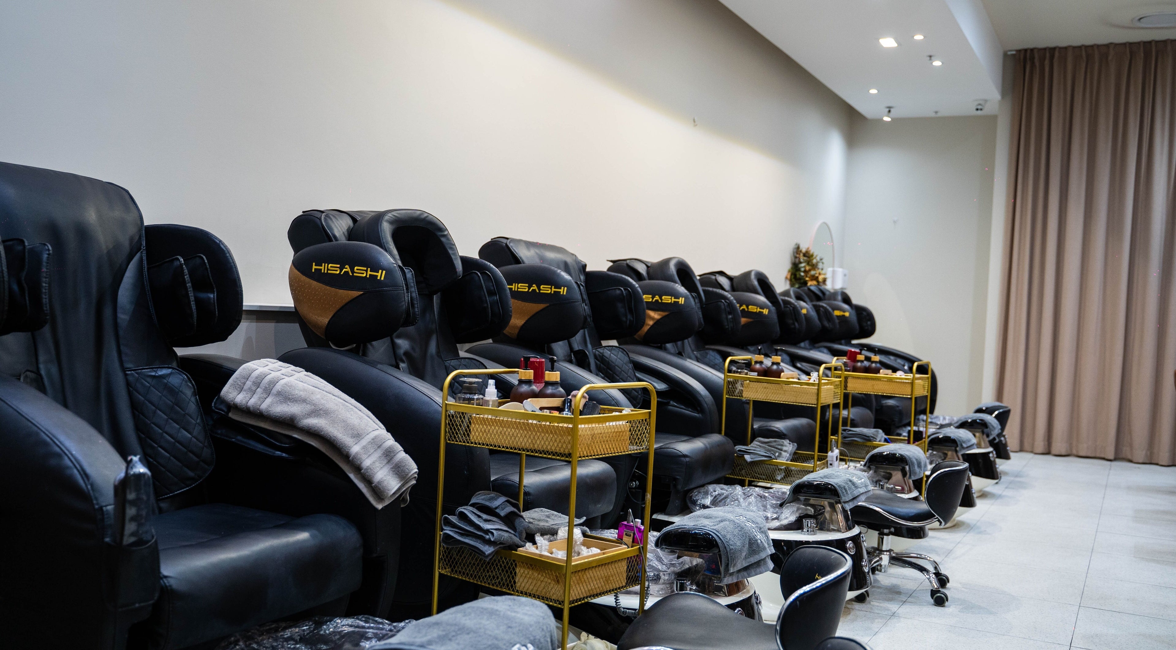 Luxurious pedicure chairs at The Nail Bar By Creative Claws, Indooroopilly, Queensland, AU, offering ultimate comfort.