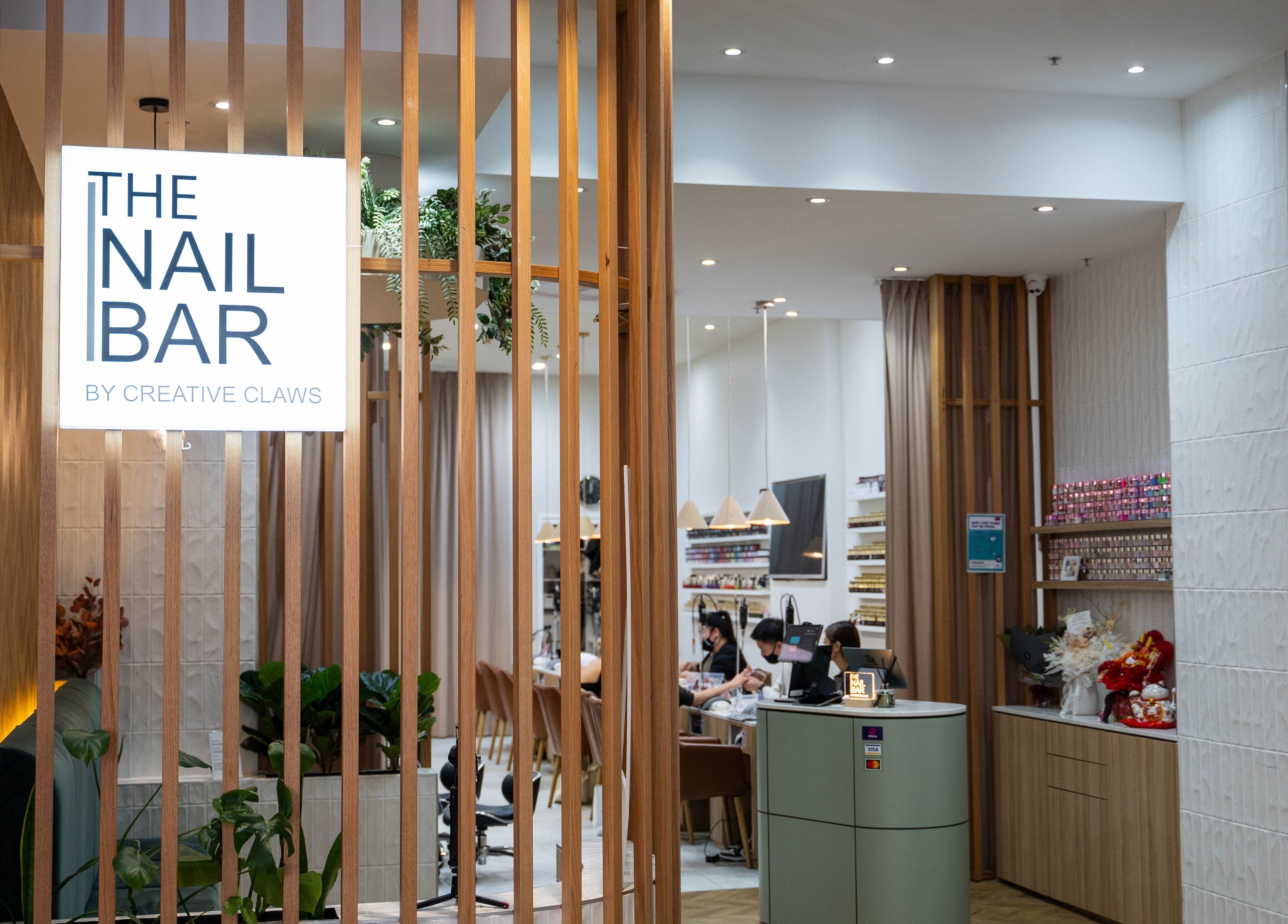The Nail Bar By Creative Claws entrance in Indooroopilly, Queensland, AU showcasing a modern interior design.