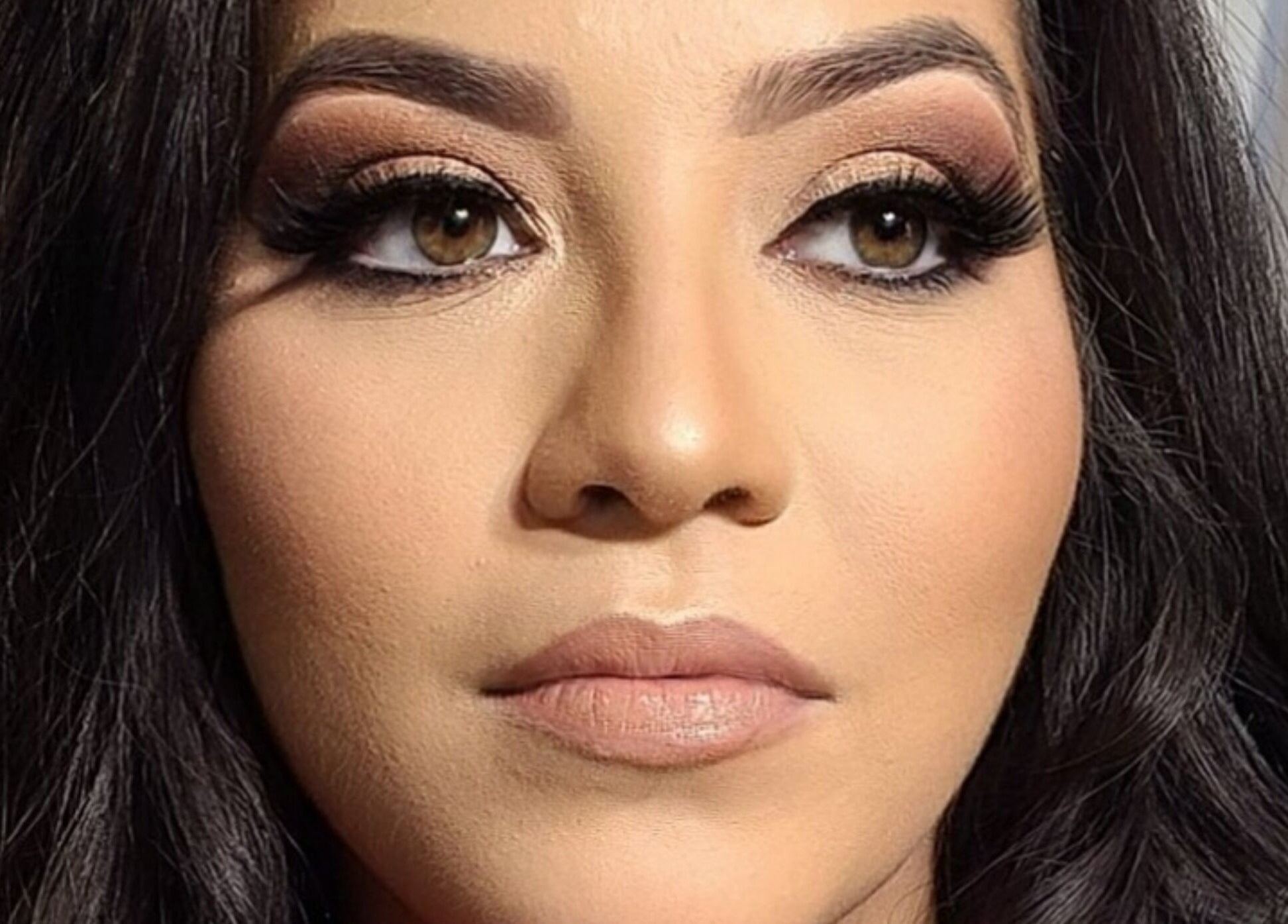 Expert makeover at Pink & Pampered Salon in Chicago, Illinois, US, showcasing professional makeup artistry.