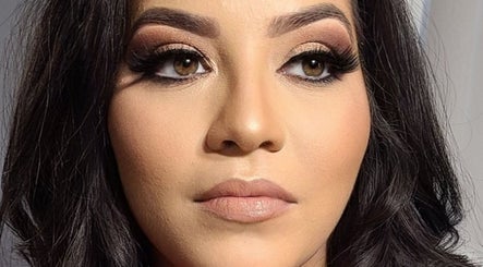 Expert makeover at Pink & Pampered Salon in Chicago, Illinois, US, showcasing professional makeup artistry.