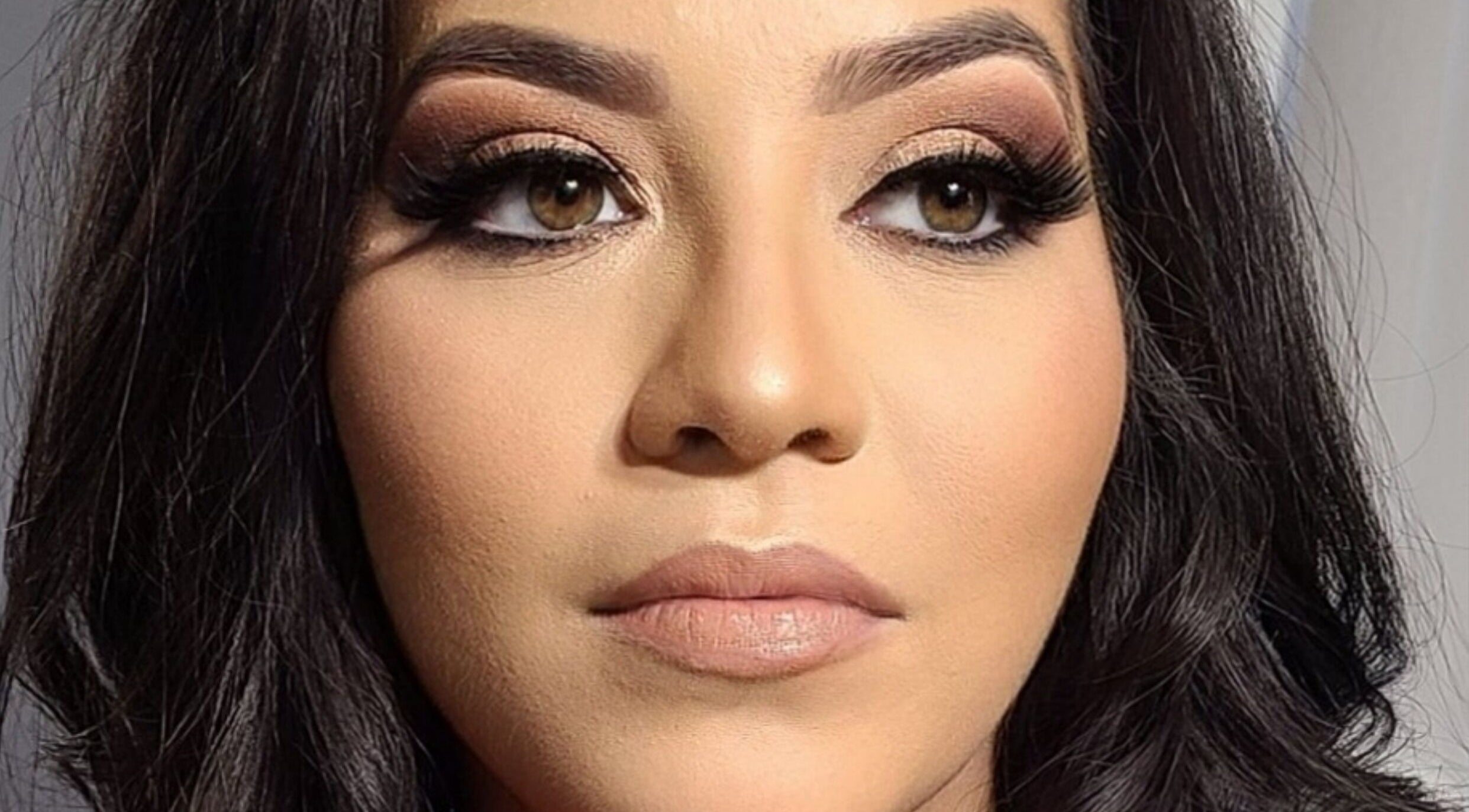 Expert makeover at Pink & Pampered Salon in Chicago, Illinois, US, showcasing professional makeup artistry.