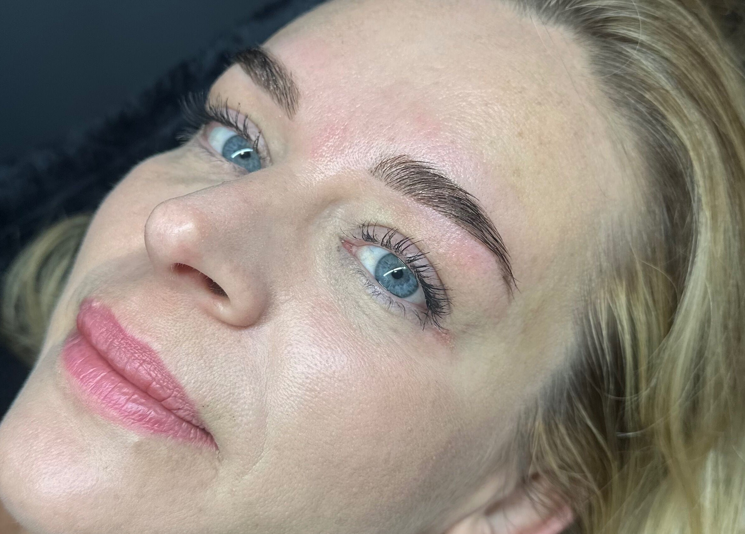 G L O Y À in Rochester, England, GB showcases expertly styled eyebrows and lips for perfect beauty enhancement.