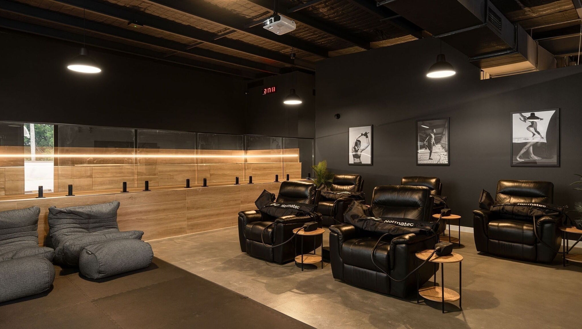 Relaxing lounge chairs at Recovery Room Sippy Downs, Queensland, AU offer a serene wellness experience.