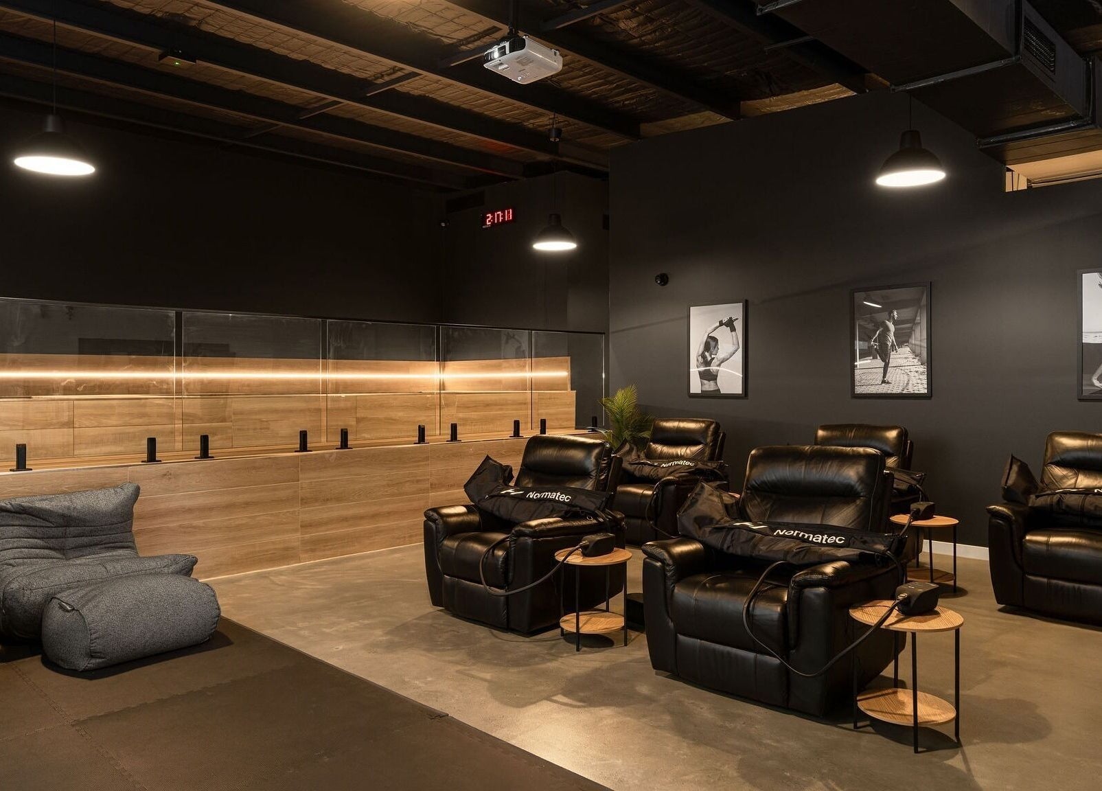 Relaxing lounge chairs at Recovery Room Sippy Downs, Queensland, AU offer a serene wellness experience.