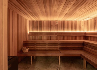 Peaceful sauna at Recovery Room Sippy Downs, Sippy Downs, Queensland, AU with warm wooden interior.