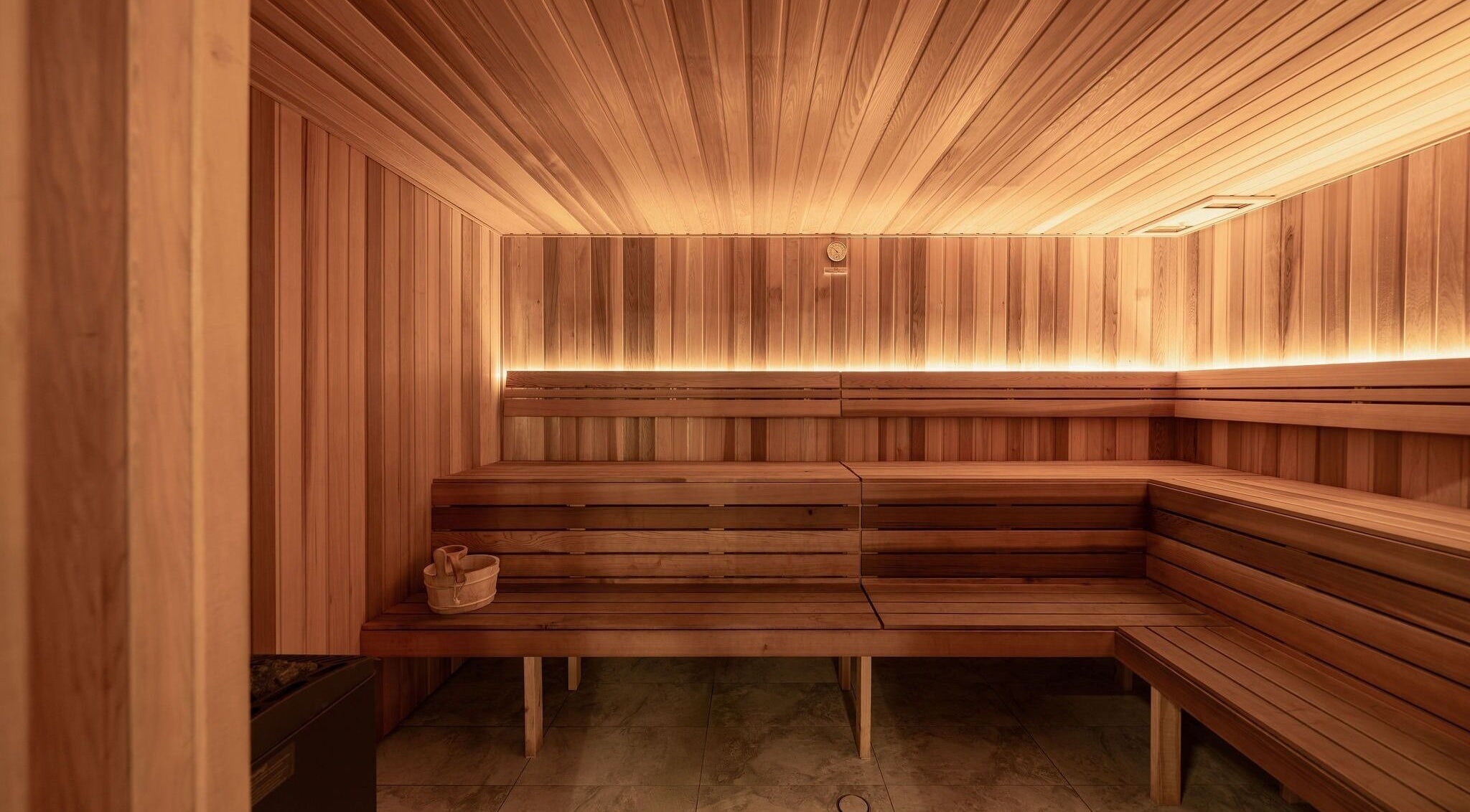 Peaceful sauna at Recovery Room Sippy Downs, Sippy Downs, Queensland, AU with warm wooden interior.