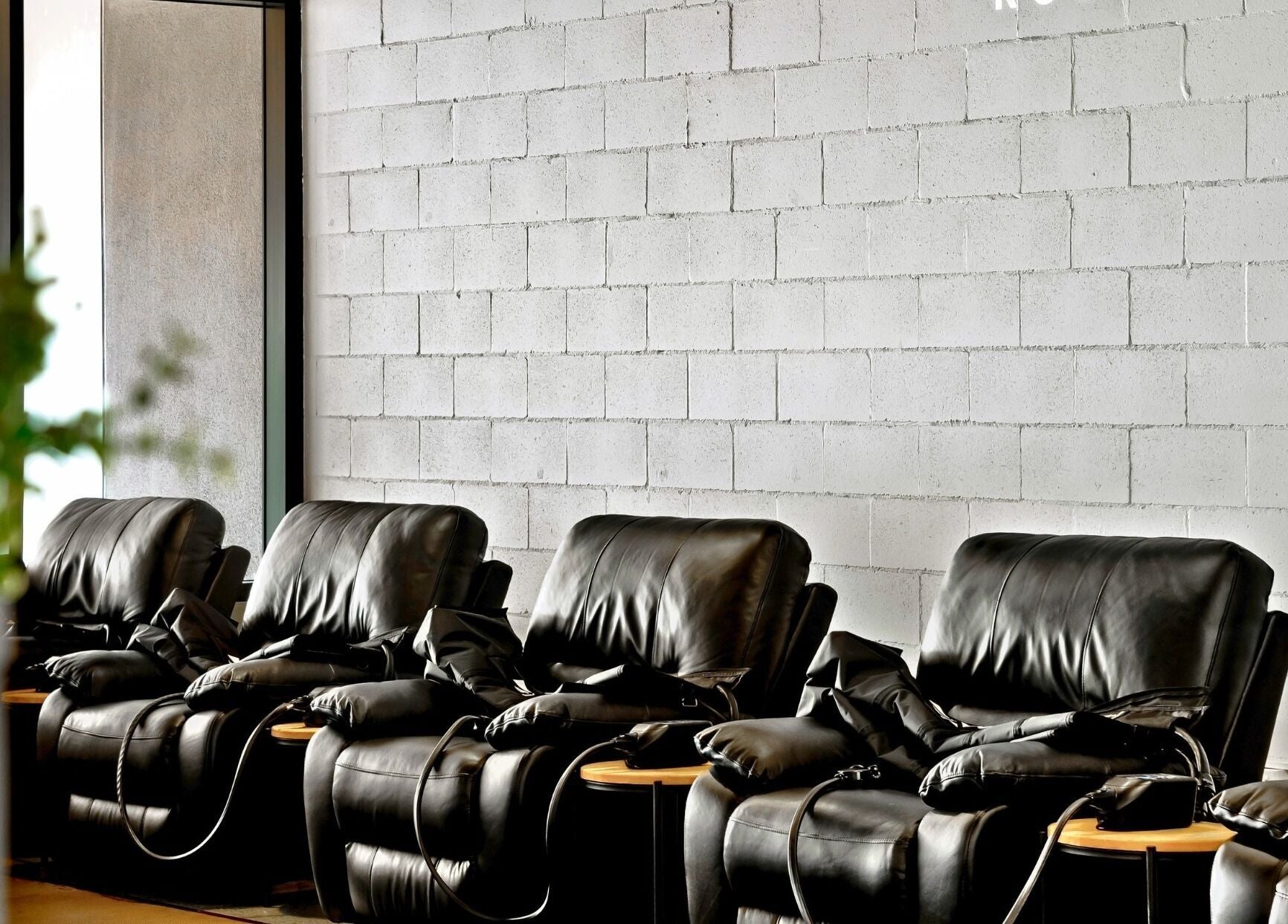 Comfortable leather chairs at Recovery Room Kawana Waters, Bokarina, Queensland, AU for ultimate relaxation.