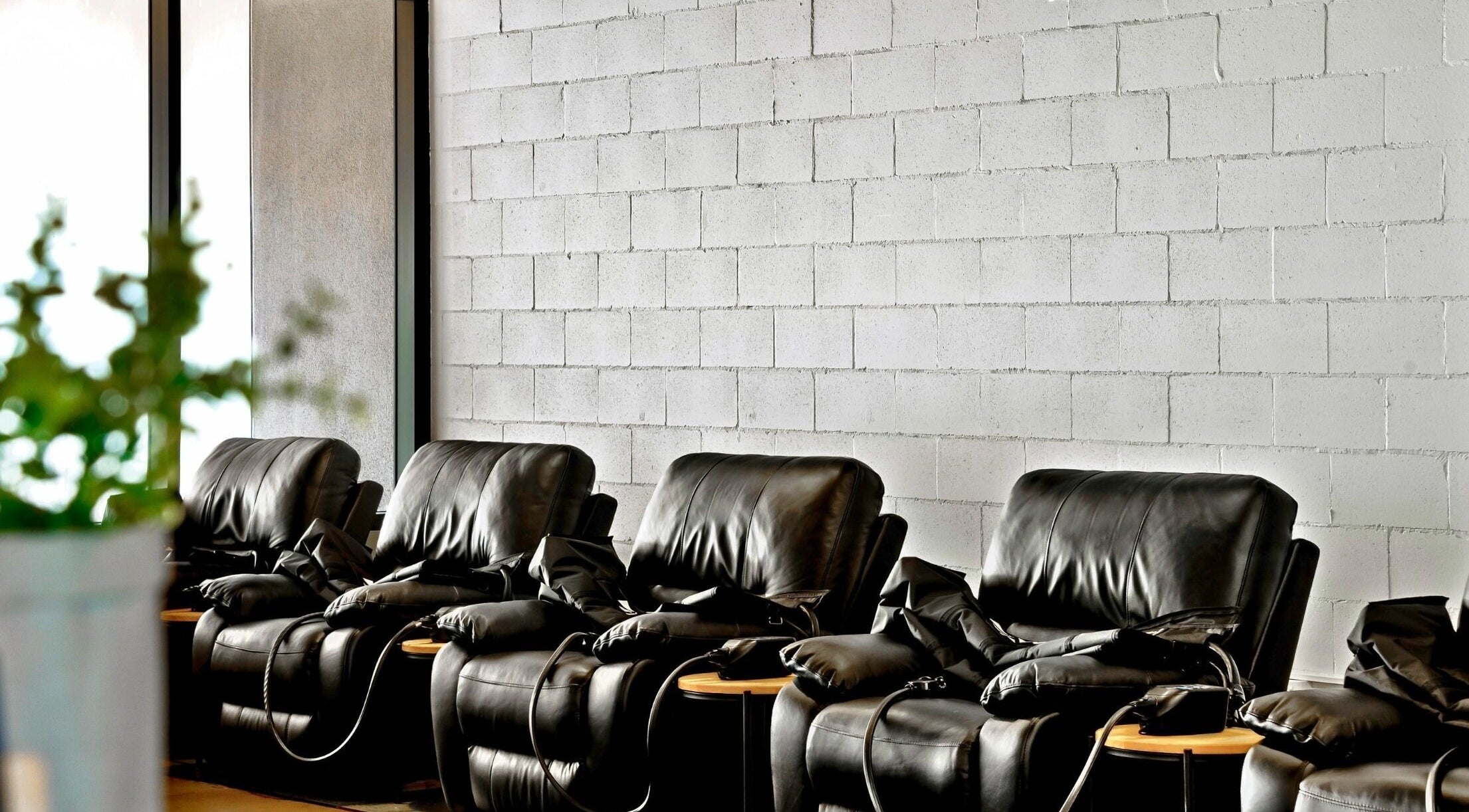 Comfortable leather chairs at Recovery Room Kawana Waters, Bokarina, Queensland, AU for ultimate relaxation.