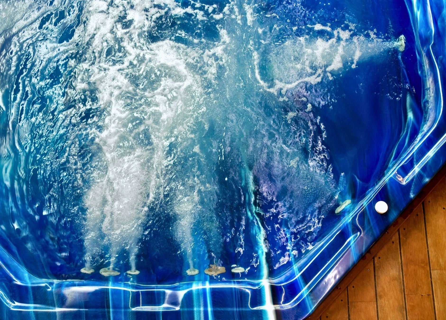 Luxurious jacuzzi at Recovery Room Kawana Waters in Bokarina, Queensland, AU, offering a serene wellness experience.