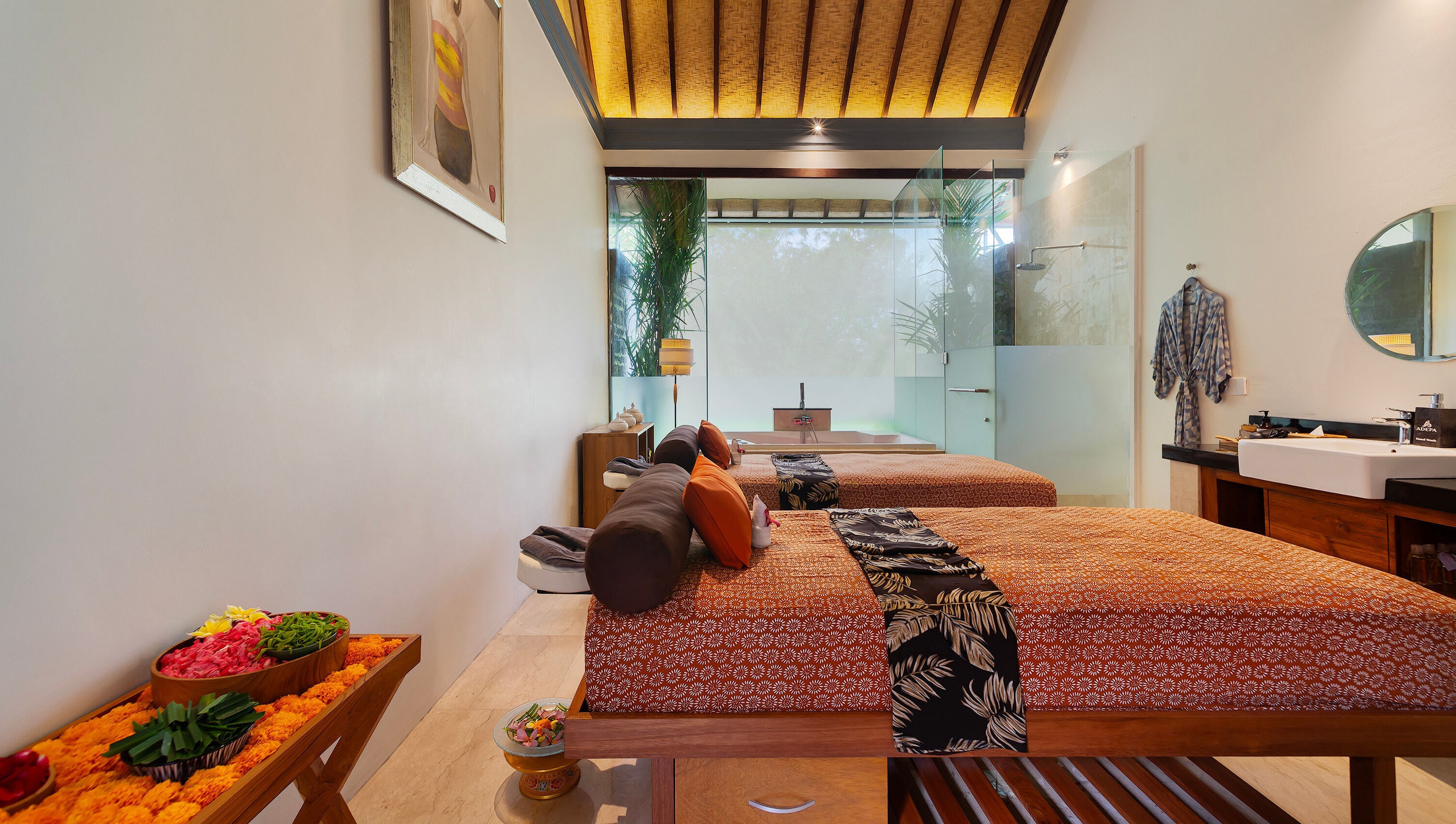 Tranquil massage room at Jivana Spa, featuring elegant decor and treatment beds in Bali, Bali, ID.