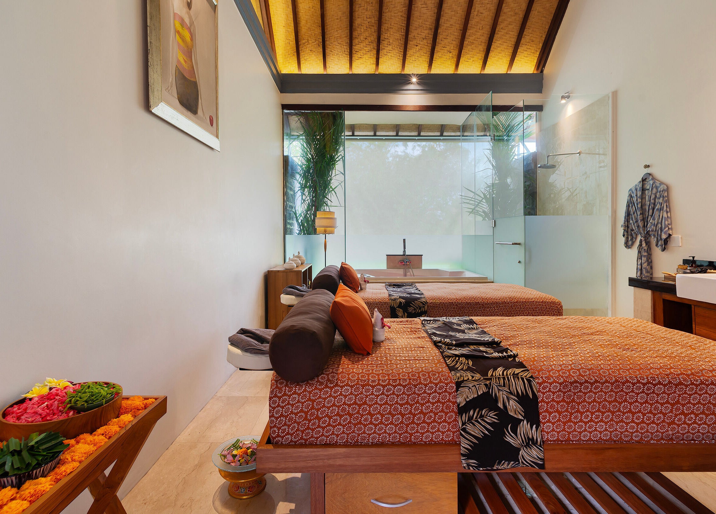 Tranquil massage room at Jivana Spa, featuring elegant decor and treatment beds in Bali, Bali, ID.
