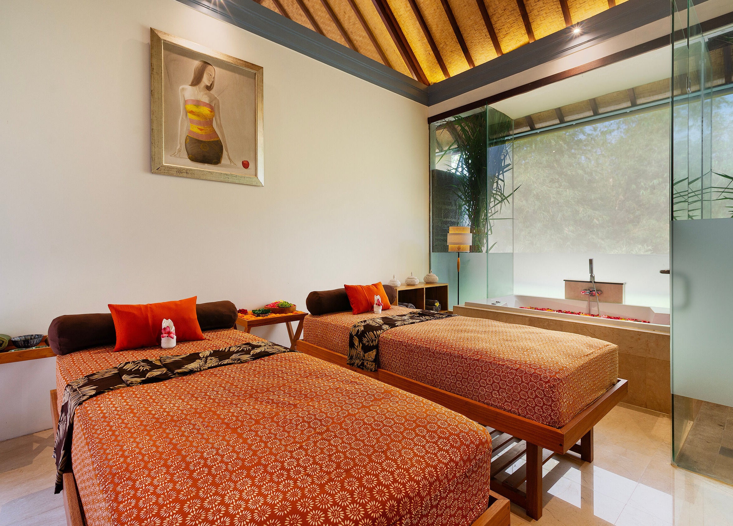 Luxurious spa room at Jivana Spa, Bali, Bali, ID featuring two massage tables and a soothing atmosphere.