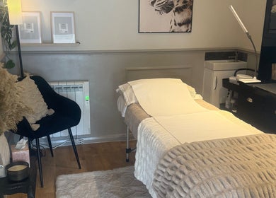 Cozy treatment room at Hagon Hair & Beauty Ltd in Brighton And Hove, England, GB, featuring a plush therapy bed.